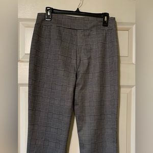 Black and White size Medium Pants with zipper on the side. Nice Thick Pants.